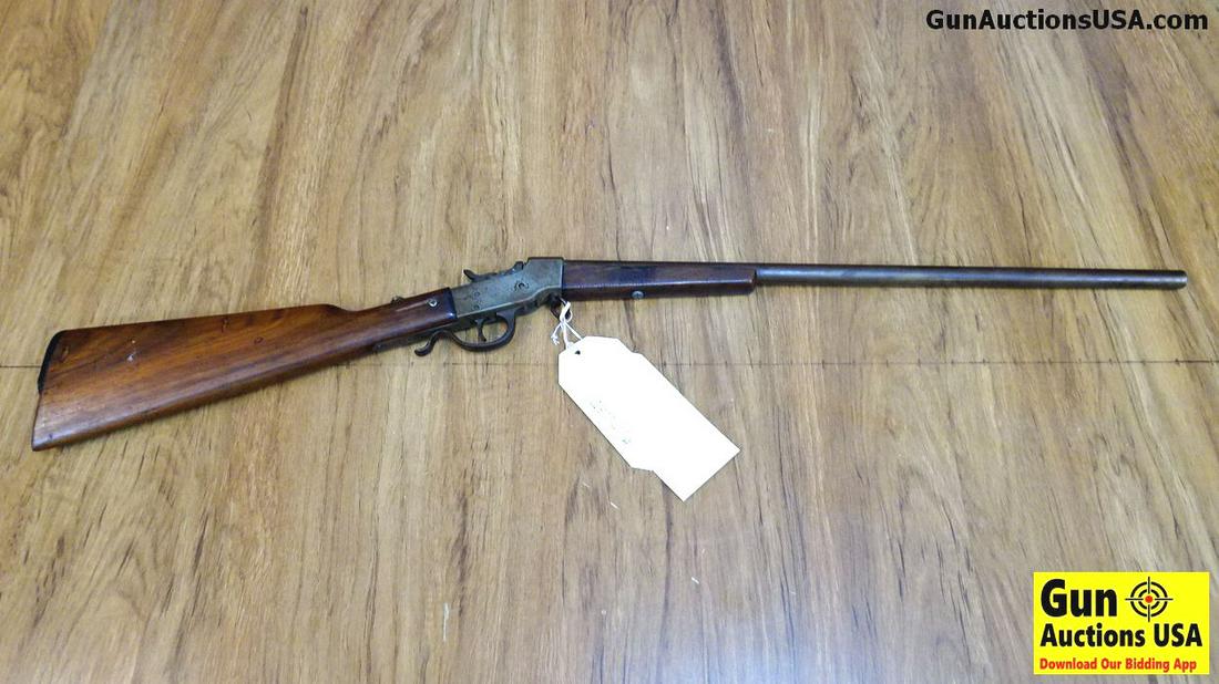 HOPKINS & ALLEN ARMS CO. FALLING BLOCK .22 LR Rifle.: HOPKINS & ALLEN ARMS CO. FALLING BLOCK .22 LR Rifle. Needs Repair. 21" Barrel. Dark Bore, Tight Action This Old Girl Still Works, The Falling Block At Some Point was Machined Turned, Sights are Missin