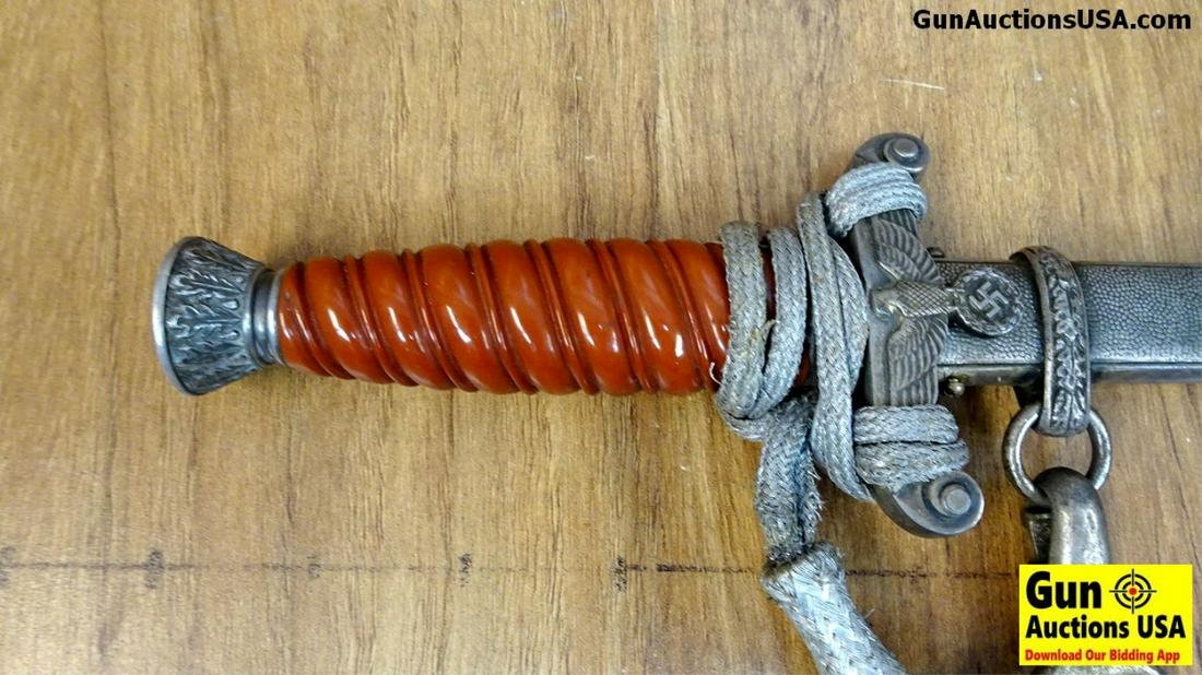 E&F Horster NAZI YOUTH DAGGER . Very Good. Double Edged: E&F Horster NAZI YOUTH DAGGER . Very Good. Double Edged 9.5 inch Blade Made Of Solingen Steel, Blade is Properly Marked and Without Blemish. Hilt is NAZI Eagle Holding Swastika, with Silver Decorative