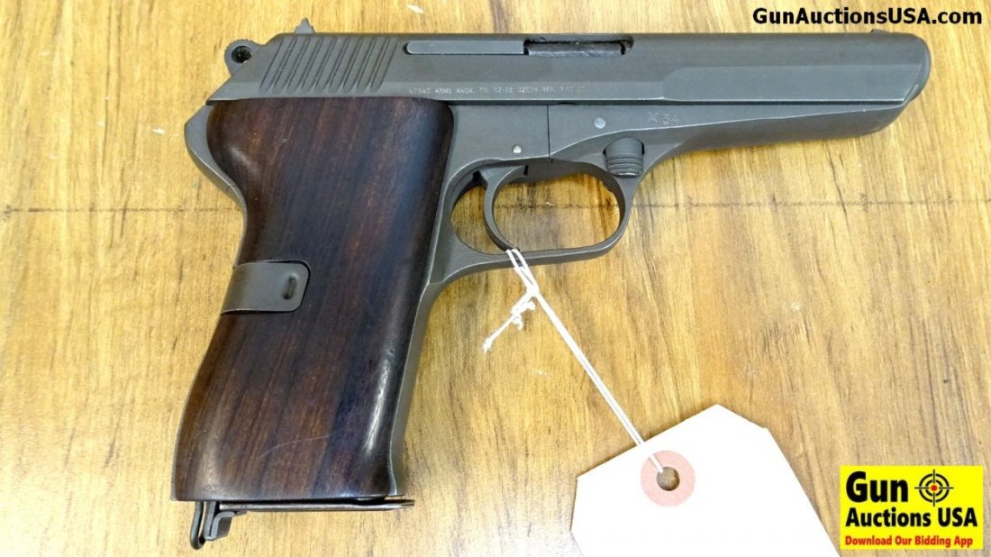 CZECH 52 7.62 X 25 Pistol. Excellent Condition. 4.5\": CZECH 52 7.62 X 25 Pistol. Excellent Condition. 4.5\" Barrel. Shiny Bore, Tight Action Features Grey Parkerized Finish, Combat Sights, Finish is Nicely Accented by Smooth Hard Wood Grips ( Hard to Fin