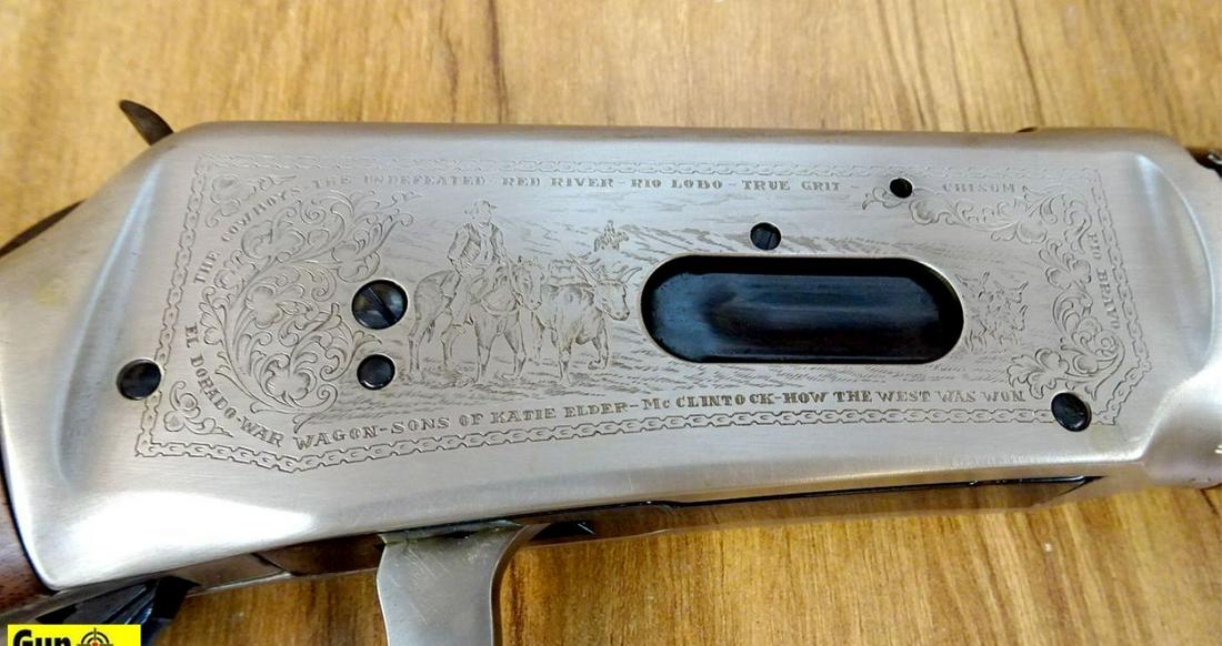 Winchester 94 JOHN WAYNE COMMEMORATIVE .32-40 WIN: Winchester 94 JOHN WAYNE COMMEMORATIVE .32-40 WIN Commemorative Rifle. NEW in Box. 18.5" Barrel. The Carbine Winchester Built to Commemorate John Wayne! Silver Large Lever Loop, Receiver and Barrel Ba