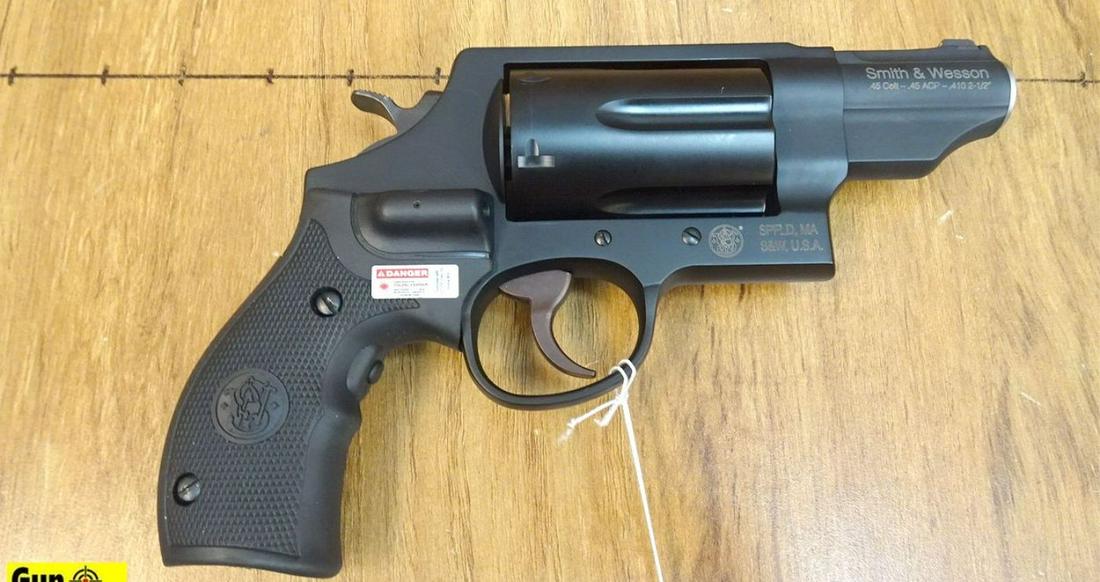 Smith & Wesson GOVERNOR .45 COLT/410 Revolver.: Smith & Wesson GOVERNOR .45 COLT/410 Revolver. Excellent Condition. 2.5" Barrel. Shiny Bore, Tight Action Includes Crimson Trace Laser Grip, Original Box & Paperwork.. SN:CTU8685 (44406)