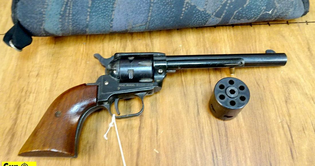 F.I.E. TEX .22 LR/ 22 MAG Revolver. Very Good. 6.5": F.I.E. TEX .22 LR/ 22 MAG Revolver. Very Good. 6.5" Barrel. Shiny Bore, Tight Action Convertible with Both Cylinder, 22LR and 22 Magnum. Bore is Crisp, Stocks are Smooth Hardwood, Weapon has Fixed Sig