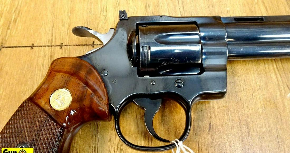 Colt PYTHON .357 MAGNUM COLLECTOR'S Revolver. Very: Colt PYTHON .357 MAGNUM COLLECTOR'S Revolver. Very Good. 8" Barrel. Shiny Bore, Tight Action PYTHON TARGET with Matt Top Strap and Target Adjustable Sights. Full Underlug Barrel Enclosing Ejector Rod,
