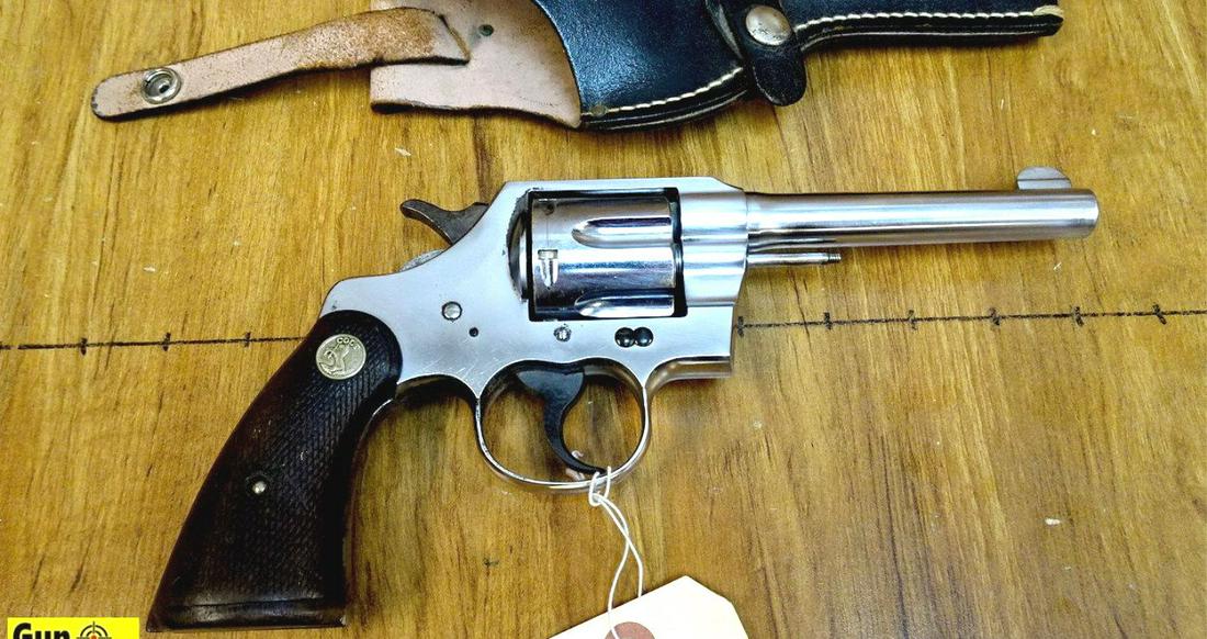 COLT OFFICIAL .38 Cal. Revolver. Good Condition. 5": COLT OFFICIAL .38 Cal. Revolver. Good Condition. 5" Barrel. Shiny Bore, Tight Action This Nice Old Colt Has been Refinished at Some Point in its Life, Functionally Sound, Retains Original Checkered Co
