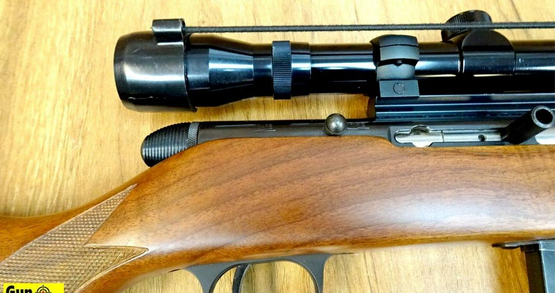 H&R 700DL .22 W.M.R.F. Rifle. Excellent Condition. 22": H&R 700DL .22 W.M.R.F. Rifle. Excellent Condition. 22" Barrel. Shiny Bore, Tight Action Not Just a Model 700, But the Deluxe Version. Features High Grade Checkered Walnut Stock with Nice Figure, High 