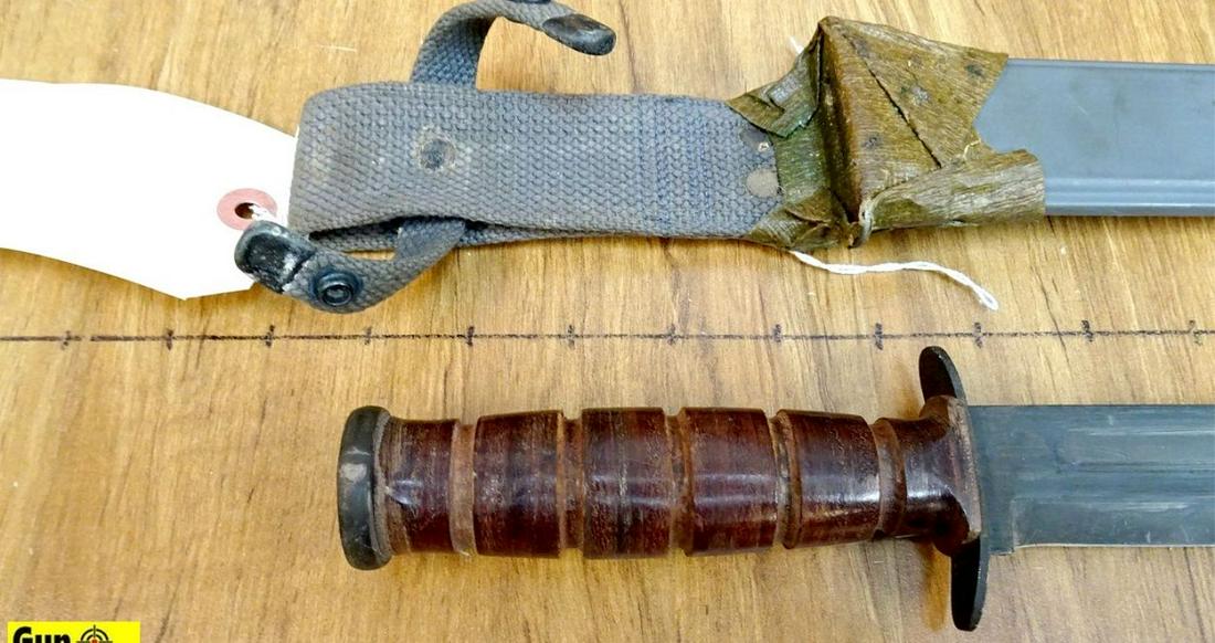 MK2 Bayonet. U.S. Navy Fighting Knife Groove, Stacked: MK2 Bayonet. U.S. Navy Fighting Knife Groove, Stacked Leather Handle and Steel Pummel with Fiberglass Scabbard . (45187)
