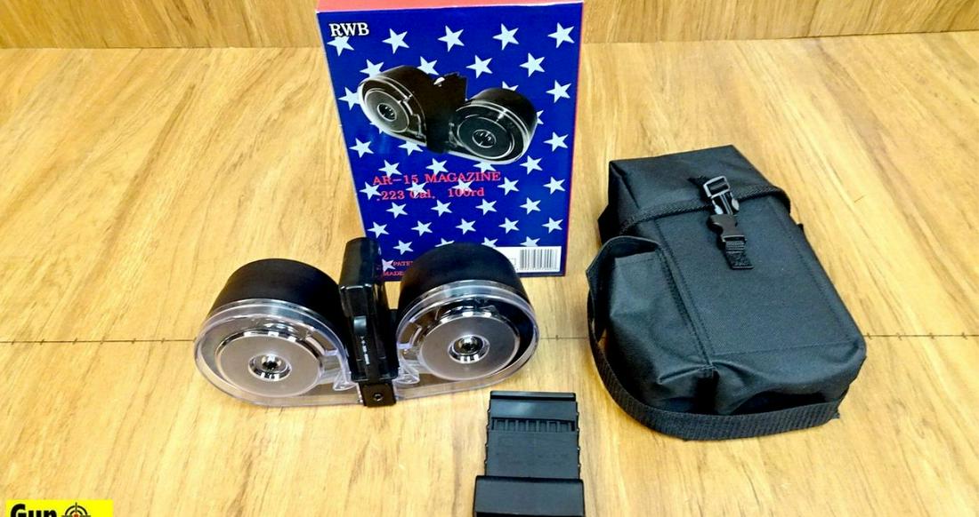 RWB AR-15 .223 Drum. NEW in Box. One, Black 100 Round: RWB AR-15 .223 Drum. NEW in Box. One, Black 100 Round Drum for a AR15. Includes Carry Case and Speed Loader all New in the Box. . (44376)