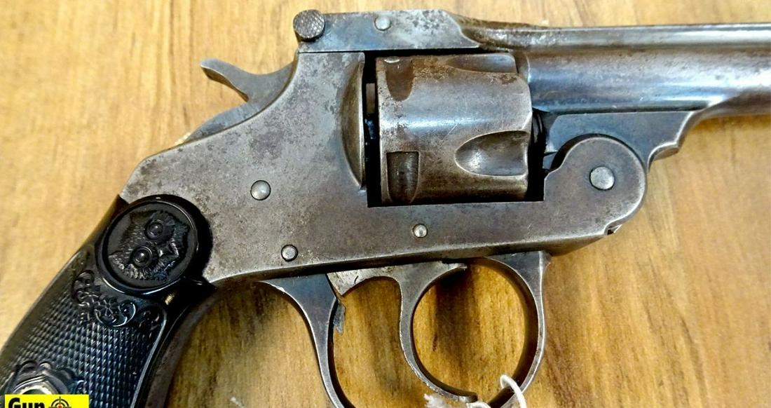 IVER JOHNSON ARMS & CYCLE WORKS TOP BREAK .32 Cal.: IVER JOHNSON ARMS & CYCLE WORKS TOP BREAK .32 Cal. Revolver. Needs Repair. 3" Barrel. Shootable Bore Take Note, Barrel Stamped Arms and Cycle Works. Bluing is Fading into Patina, Action Still Works, L