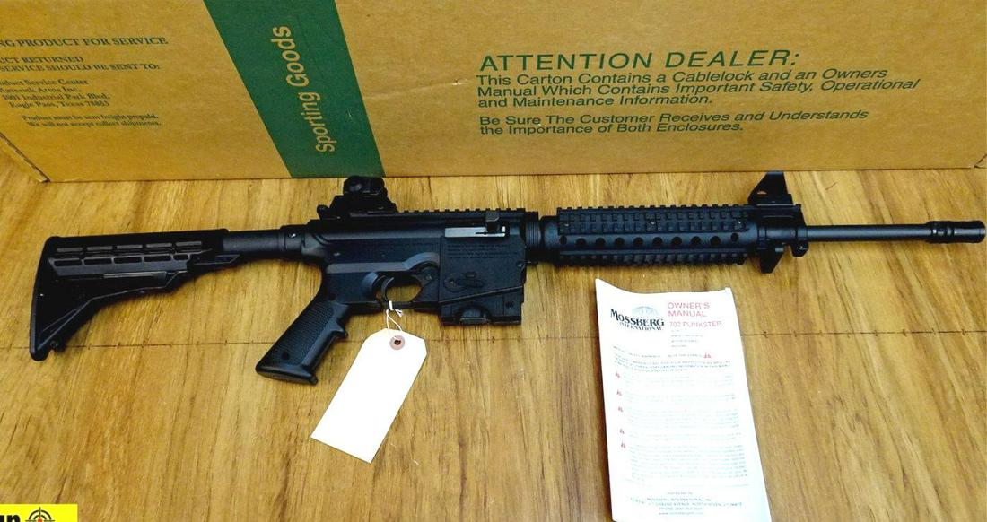 Mossberg 715T .22 LR Rifle. NEW in Box. 16" Barrel.: Mossberg 715T .22 LR Rifle. NEW in Box. 16" Barrel. Resembles a AR, Features a Polymer Lower, Quad Rail on Forend, Removable Adjustable Sights, Fixed ATI Car Configuration Stock. Includes one original