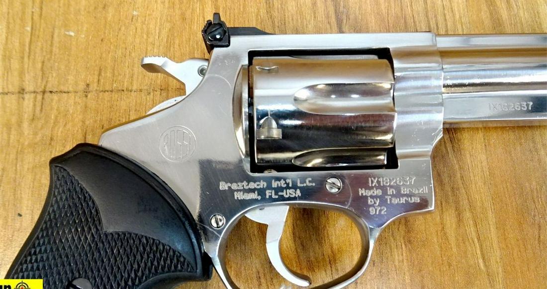ROSSI 972 .357 MAGNUM Revolver. NEW in Box. 6" Barrel.: ROSSI 972 .357 MAGNUM Revolver. NEW in Box. 6" Barrel. Attractive High Glass Stainless Finish, Full Underlug Barrel Protecting Ejector Rod, Red Ramp Front Sight with White Outline Rear, Adjustable For