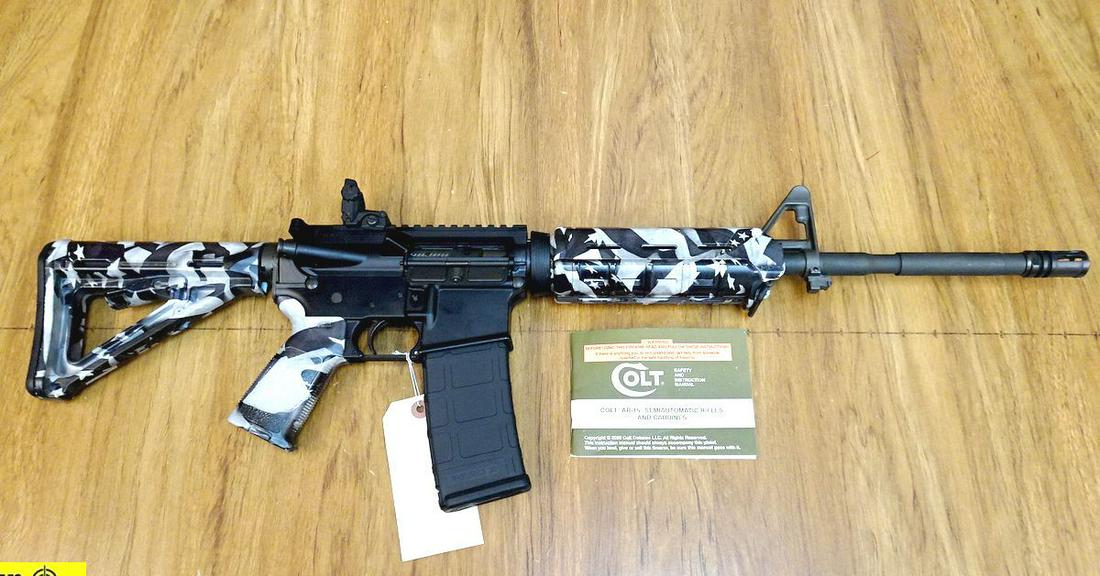 Colt M4 CARBINE 5.56 NATO UNFIRED Rifle. Like New. 16": Colt M4 CARBINE 5.56 NATO UNFIRED Rifle. Like New. 16" Barrel. Barrel is in M4 Configuration, Marked 5.56 NATO with a 1:7 Twist. Entire Weapon is in Grey, American Flag Furniture, Front Sight Post has