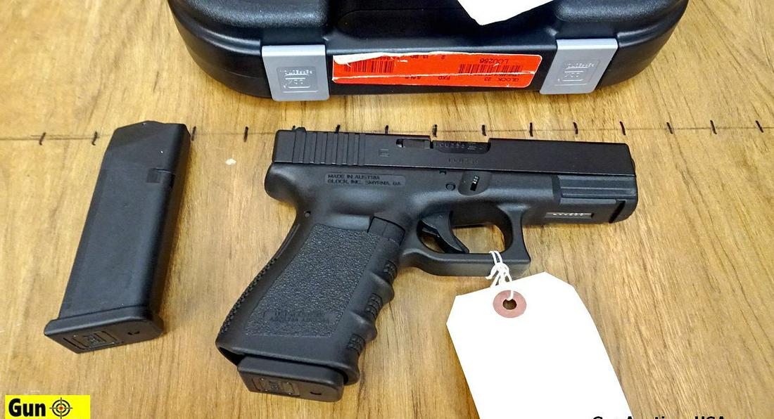 Glock 23 .40 Pistol. Like New. 4" Barrel. Standard: Glock 23 .40 Pistol. Like New. 4" Barrel. Standard Glock Sights, Black Steel Slide, Nicely Textured Lower with Finger Grooves and Light Rail, Standard Glock Controls, Two 13 Round Magazines, Box and P
