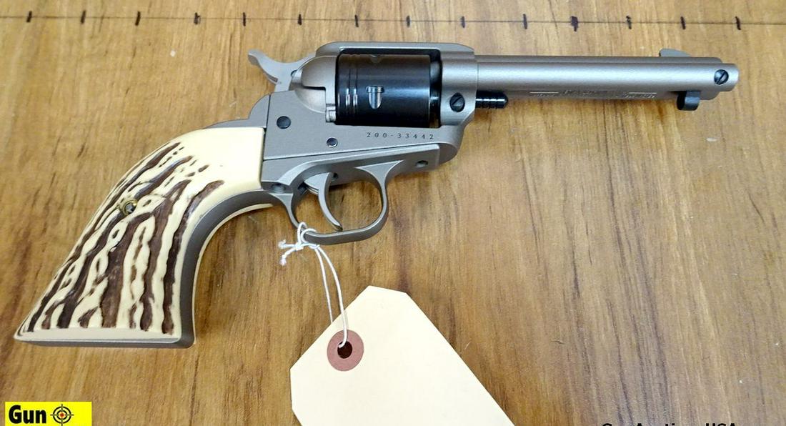 Ruger WRANGLER .22 LR Revolver. Like New. 4.5" Barrel.: Ruger WRANGLER .22 LR Revolver. Like New. 4.5" Barrel. Silver/Grey Finish with Black Cylinder, Fixed Sights, Stagalon Grips, as Well as Black Checkered Factory Grips, Includes Box and Papers. . SN:200
