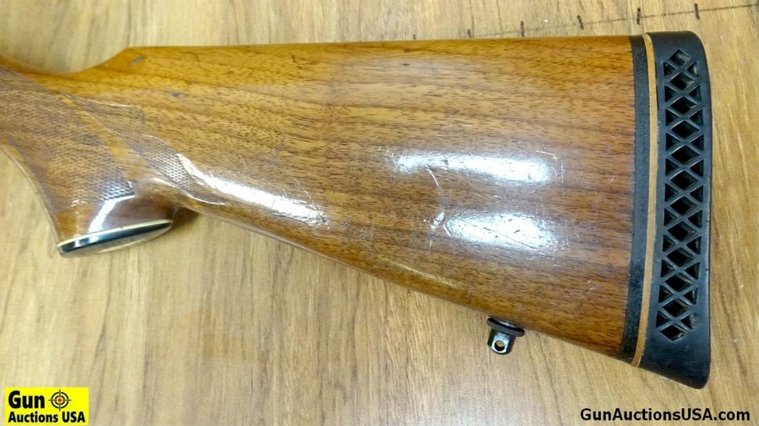 REMINGTON 1100 20 ga. MAGNUM Shotgun. Very Good. 28": REMINGTON 1100 20 ga. MAGNUM Shotgun. Very Good. 28" Barrel. Shiny Bore, Tight Action Magnum 1100, Barrel Stamped for 3 Inch Shells, High Ventilated Rib with Siler Bead Front sight and is Choked Full.