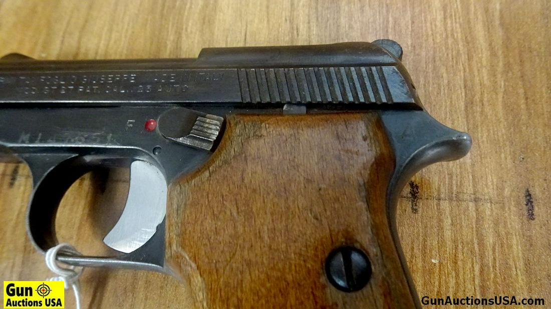 ARMI TANFOGLIO GT 27 .25 Cal. Pistol. Good Condition.: ARMI TANFOGLIO GT 27 .25 Cal. Pistol. Good Condition. 2.5" Barrel. Shiny Bore, Tight Action Features Fixed Sights with Open Slide Design, Hammer on Rear Slide, Solid Trigger, Heel Style Mag Release wi