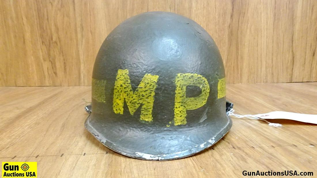 U.S. Military Helmet. Very Good. Steel Helmet with: U.S. Military Helmet. Very Good. Steel Helmet with Fiberglass Liner and Head Band, Chin Strap is on Steel Pot, Marked MP. . (50609)