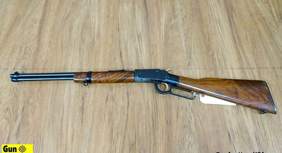 ITHACA M-49 .22 S-L-LR Rifle. Fair Condition. 18": ITHACA M-49 .22 S-L-LR Rifle. Fair Condition. 18" Barrel. Shootable Bore, Tight Action Old School Lever Gun with Walnut Stock, Some Bluing Missing, with Minor Pitting. Sling Swivel Studs Included, Adj