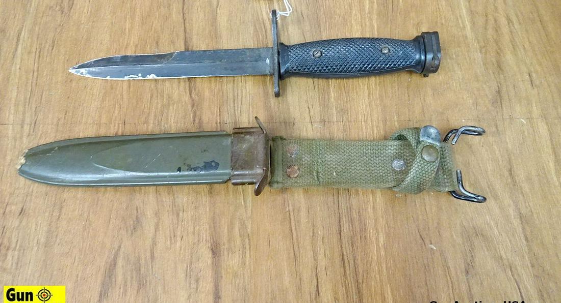 Military COLLECTOR'S Bayonet. Fair Condition. Features a 6.5" Blade, 11.5" Overall. U.S. Rifle: Military COLLECTOR'S Bayonet. Fair Condition. Features a 6.5" Blade, 11.5" Overall. U.S. Rifle Bayonet with Black Polymer Grips, Includes a U.S. M8 BM.CO. Olive Drab Sheath. Tip of Blade Slightly Bent