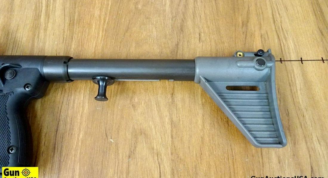 KEL-TEC SUB 2000 9MM Glock 19 Grip Rifle. Excellent Condition. 16" Barrel. Shiny Bore, Tight Action: KEL-TEC SUB 2000 9MM Glock 19 Grip Rifle. Excellent Condition. 16" Barrel. Shiny Bore, Tight Action Very Popular Fixed Stock Carbine. Features Rear Peep Sight, Red Front Ramp Sight, Grey Polymer Furni