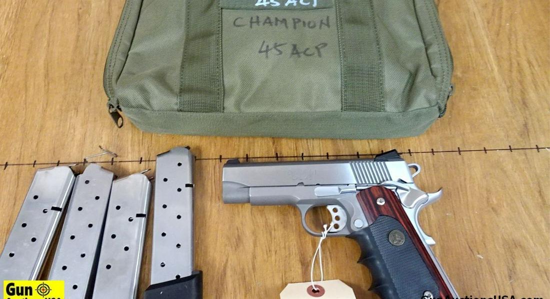 SPRINGFIELD CHAMPION .45 ACP Pistol. Very Good. 4" Barrel. Shiny Bore, Tight Action All Stainless: SPRINGFIELD CHAMPION .45 ACP Pistol. Very Good. 4" Barrel. Shiny Bore, Tight Action All Stainless Steel Construction, Skeletonized Hammer and Trigger, Novak Style Rear Night Sights, Front Blade Night