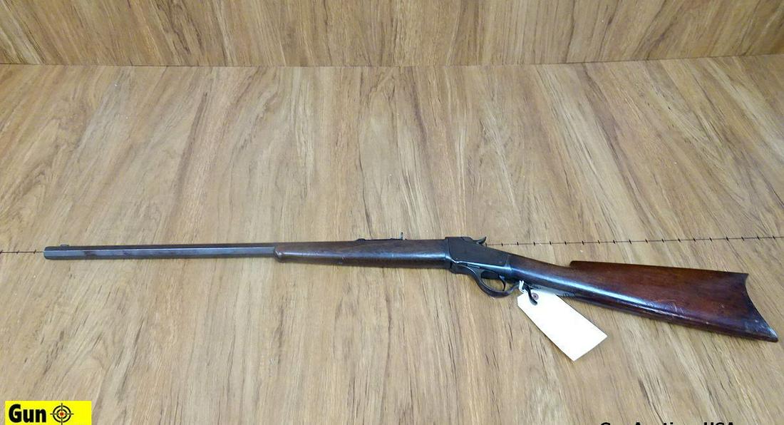Winchester 1885 Low Wall .32L LOW WALL . Very Good. 24" Barrel. Dark Bore, Tight Action Straight: Winchester 1885 Low Wall .32L LOW WALL . Very Good. 24" Barrel. Dark Bore, Tight Action Straight Walnut Stock with Schnabel Forend, Spur Hammer, Steel Crescent Butt, Normal Handling Marks For Age, Adj