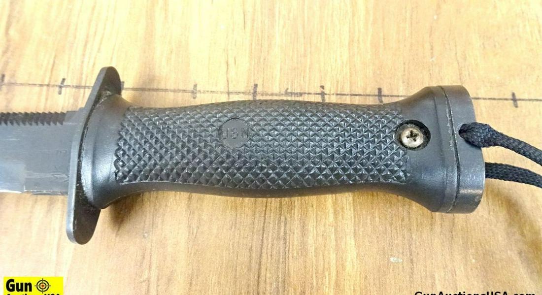 U.S. Navy MKIII\0 Bayonet. Very Good. Saw Back, Metal and Polymer Military Bayonet, 11" Overall with: U.S. Navy MKIII\0 Bayonet. Very Good. Saw Back, Metal and Polymer Military Bayonet, 11" Overall with a 6" Blade. Includes Polymer Scabbard, With Leg Tie Down. . SN:2V376 (56364)