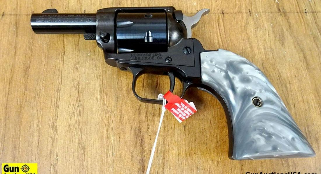 Heritage BARKEEP .22 LR BARKEEP Revolver. NEW in Box. 2.5" Barrel. Beautiful Glossy Black Finish,: Heritage BARKEEP .22 LR BARKEEP Revolver. NEW in Box. 2.5" Barrel. Beautiful Glossy Black Finish, with a Handy Shorter Barrel. Grey Faux Pearl Grips, 6 Round, Steel Checkered Spur Hammer, Fluted Cylin