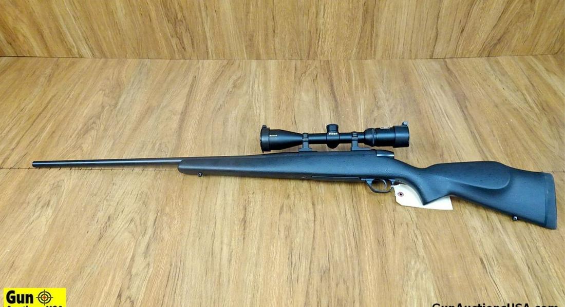 Weatherby MARK V .257 WEATHERBY MAGNUM Bolt Action Rifle. Excellent Condition. 27" Barrel. Shiny: Weatherby MARK V .257 WEATHERBY MAGNUM Bolt Action Rifle. Excellent Condition. 27" Barrel. Shiny Bore, Tight Action Fluted Bolt, Black One Piece Synthetic Stock with Pachmayr Butt Pad, Steel Floor Pla