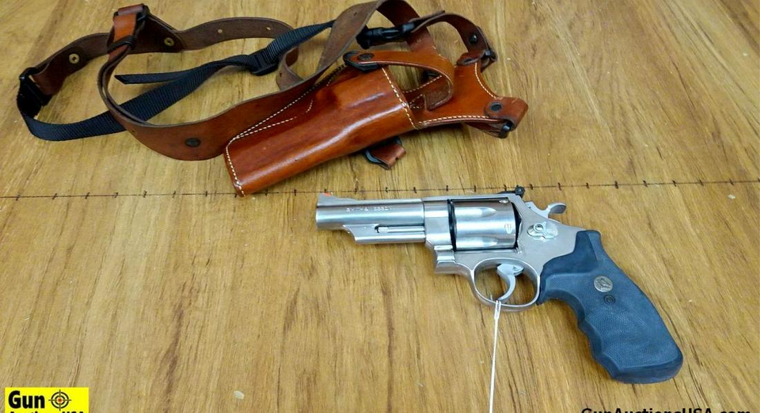 Smith & Wesson 6291 .44 MAGNUM MAGNUM Revolver. Excellent Condition. 4" Barrel. Shiny Bore, Tight: Smith & Wesson 6291 .44 MAGNUM MAGNUM Revolver. Excellent Condition. 4" Barrel. Shiny Bore, Tight Action Features a Factory Red Ramp Front Sight, Adjustable Rear Iron Sight, Fluted 6 Shot Stainless St