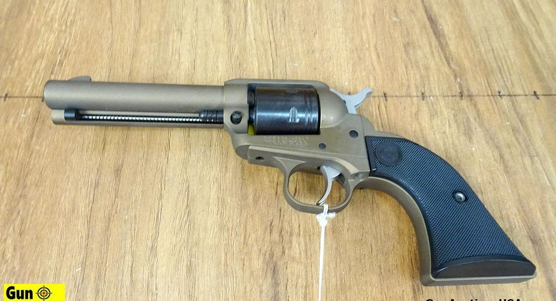 Ruger WRANGLER .22 LR Revolver. NEW in Box. 4 5/8" Barrel. Beautiful Burnt Bronze Cerakote Finish,: Ruger WRANGLER .22 LR Revolver. NEW in Box. 4 5/8" Barrel. Beautiful Burnt Bronze Cerakote Finish, Ramp Front Sight, Notch Rear Sight, Stainless Steel Checkered Spur Hammer, Shrouded Ejector Rod, Non 