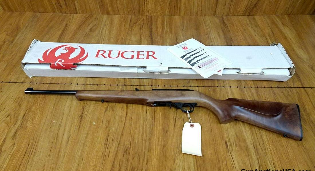 Ruger 10-22 .22 LR Semi Auto Rifle. NEW in Box. 18.5" Barrel. Satin Black Fnish,One Piece Hardwood,: Ruger 10-22 .22 LR Semi Auto Rifle. NEW in Box. 18.5" Barrel. Satin Black Fnish,One Piece Hardwood, Custom Bass Engraved Stock with Schnabel Forend. Folding Diamond Rear Sight, Brass Bead Front Sight,