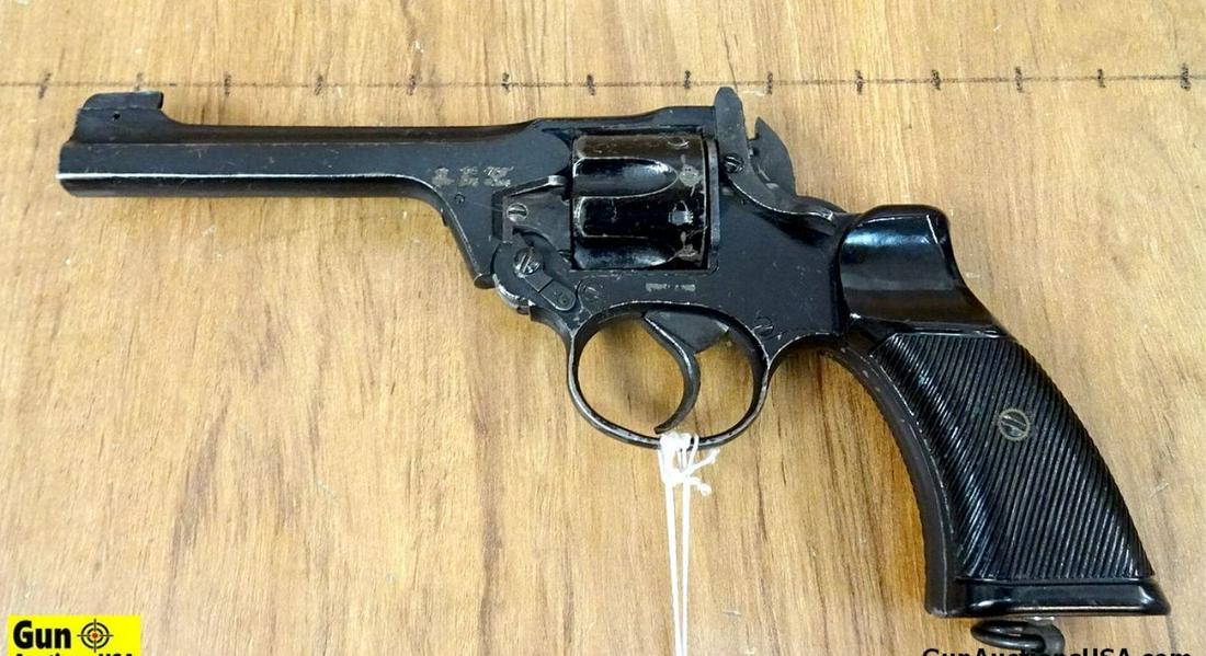 BRITISH ENFIELD .38 Cal. Revolver. 5" Barrel. Produced Between 1932-1957. Spurless .38 Caliber,Black: BRITISH ENFIELD .38 Cal. Revolver. 5" Barrel. Produced Between 1932-1957. Spurless .38 Caliber,Black Bakerlite Hand Grips, Normal Handling Marks Due to age. Includes Leather Holster. . SN:8336 United 