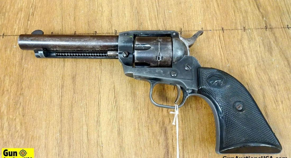 EIG, FIE E15 .22 LR Revolver. Fair Condition. 4.5" Barrel. Shootable Bore Black Polymer Buffalo: EIG, FIE E15 .22 LR Revolver. Fair Condition. 4.5" Barrel. Shootable Bore Black Polymer Buffalo Grips, Blade Front Sight, Notch Rear Sight, Large Spur Hammer, Shrouded Ejector Rod, Six Shot Fluted Cyl