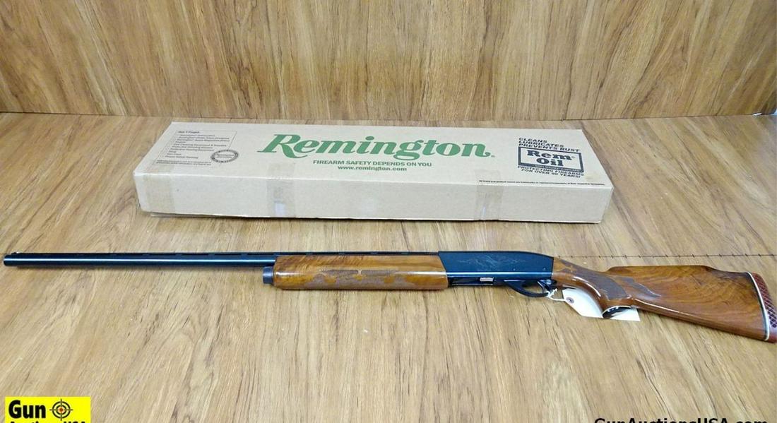 REMINGTON 1100 12 ga. Semi Auto Shotgun. Excellent Condition. 33.5" Barrel. Shiny Bore, Tight Action: REMINGTON 1100 12 ga. Semi Auto Shotgun. Excellent Condition. 33.5" Barrel. Shiny Bore, Tight Action Features a Full Ventilated Rib, White Bead Front Sight, Accepts 2 3/4" Shells, Barrel is Full Choke