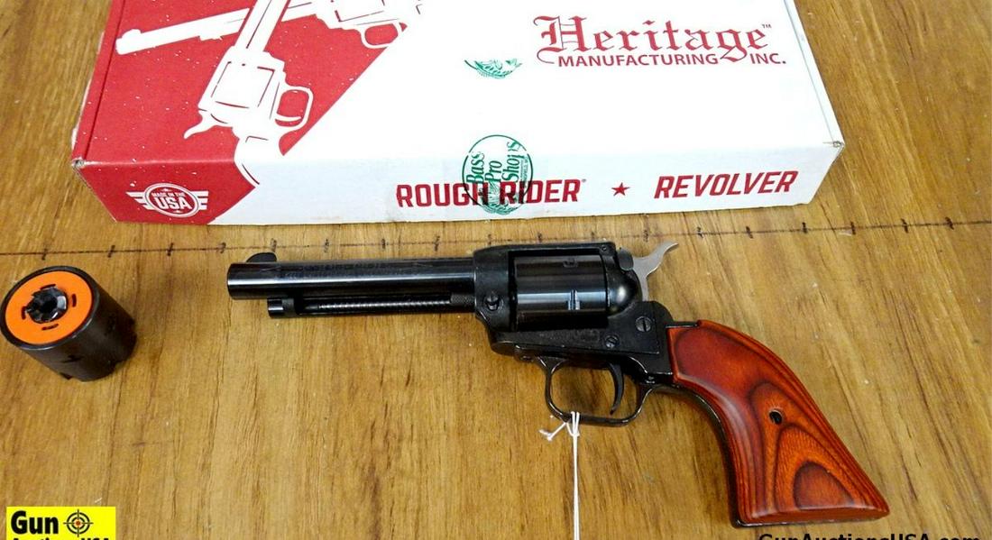 Heritage Manufacturing Inc. ROUGH RIDER .22 LR/.22 MAG Revolver. Very Good. 5" Barrel. Shiny Bore,: Heritage Manufacturing Inc. ROUGH RIDER .22 LR/.22 MAG Revolver. Very Good. 5" Barrel. Shiny Bore, Tight Action Hardwood Laminated Grips, Blade Front Sight, Notch Rear Sight, Non-Fluted 6 Shot Cylinde