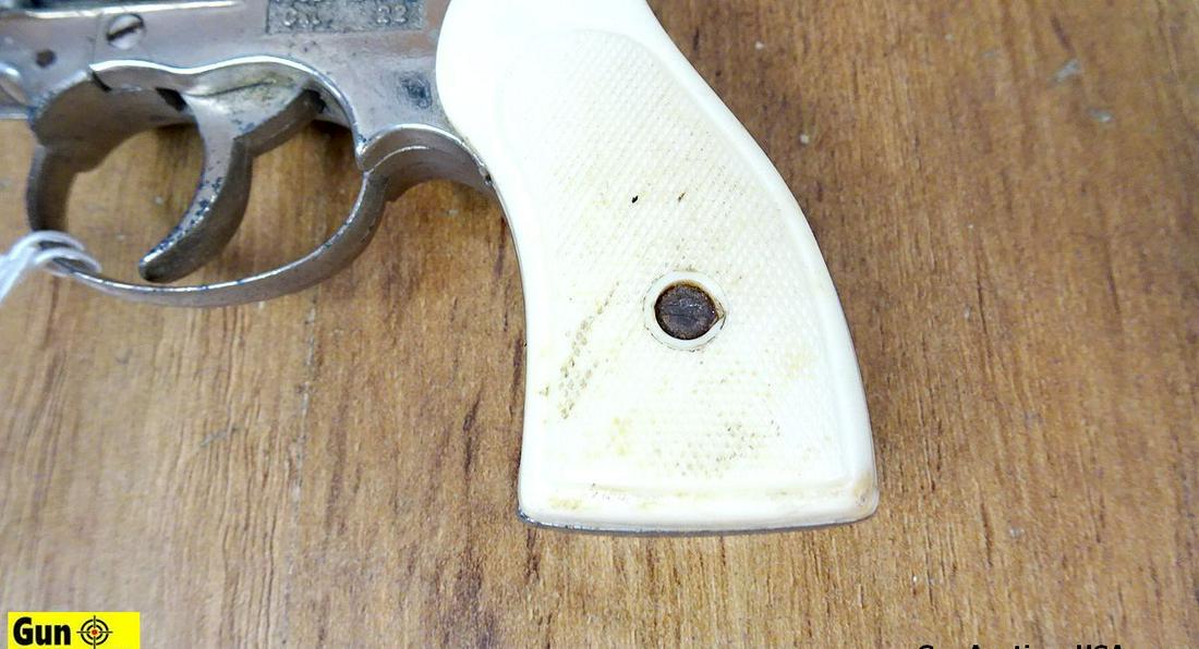 EIG 999 .22 Revolver. Good Condition. 2" Barrel. Shootable Bore, Tight Action VINTAGE Starting: EIG 999 .22 Revolver. Good Condition. 2" Barrel. Shootable Bore, Tight Action VINTAGE Starting Pistol with Nickel Type Finish, White Checkered Polymer Grips with a Checkered Hammer. STARTER PISTOL. NO