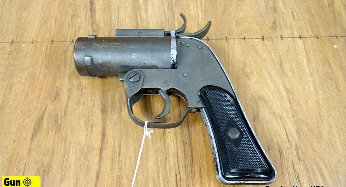 SWC Pistol Pyrotechnic M8 40 MM Single Shot COLLECTOR'S FLARE PISTOL . Good Condition. Black Polymer: SWC Pistol Pyrotechnic M8 40 MM Single Shot COLLECTOR'S FLARE PISTOL . Good Condition. Black Polymer Diamond Grips, All Steel Construction, Single Shot. FLARE GUN, No FFL Required. . (61352)