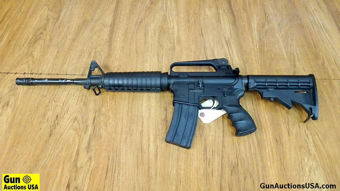DEL-TON INC DTI-15 5.56 MM Semi Auto Rifle. Very Good. 16.5" Barrel. Shiny Bore, Tight Action: DEL-TON INC DTI-15 5.56 MM Semi Auto Rifle. Very Good. 16.5" Barrel. Shiny Bore, Tight Action Compact Carbine AR with Drum Style Rear Sights, Post Front Sight, Shell Deflector, Forward Assist, 6 Posit