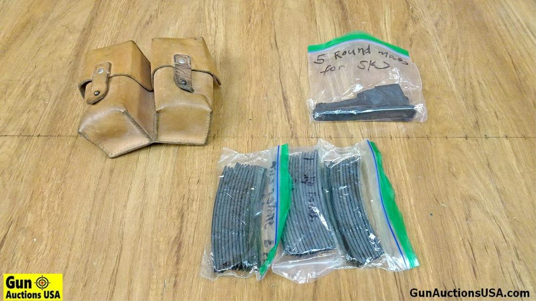 Military Surplus 7.62x39 Stripper Clips. . Good Condition. Lot of 3; One Bag of 36 SKS Stripper: Military Surplus 7.62x39 Stripper Clips. . Good Condition. Lot of 3; One Bag of 36 SKS Stripper Clips. #2, One 5 Round Steel Magazine for SKS, #3, One Surplus Leather Pouch with Cleaning Kit. . (62095
