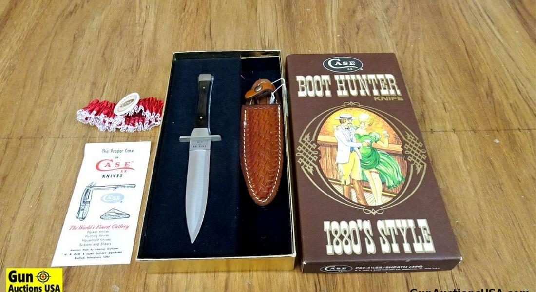 CASE BOOT HUNTER Knife. NEW in Box. 4.5" Stainless Steel Blade, Wood Handle, Double Edged Boot Knife: CASE BOOT HUNTER Knife. NEW in Box. 4.5" Stainless Steel Blade, Wood Handle, Double Edged Boot Knife with Basket Weave Style Leather Boot Sheath. Includes Box and Garter. . (62637)