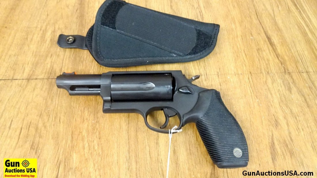 Taurus THE JUDGE .45 COLT/410 Revolver. Excellent Condition.: Taurus THE JUDGE .45 COLT/410 Revolver. Excellent Condition. 3" Barrel. Shiny Bore, Tight Action 5 Shot Fluted Cylinder, Red Fiberoptic Front Sight, Checkered Spur Hammer, Shrouded Ejector Rod, DA/SA,