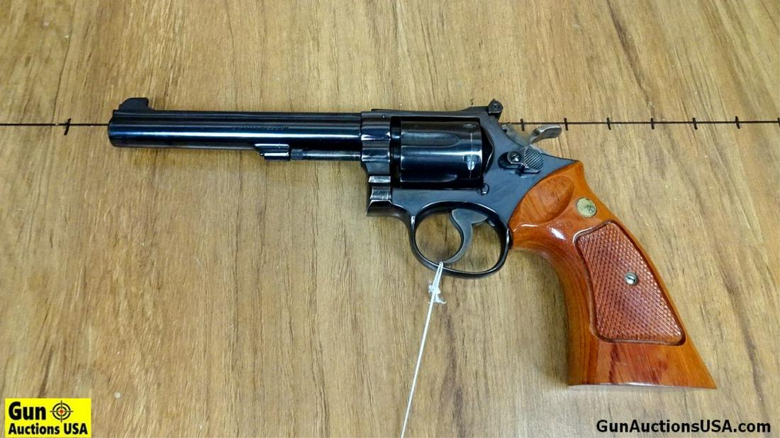 S&W 14-3 .38 S&W SPECIAL Revolver. Good Condition. 6" Barrel. Shiny Bore, Tight Action GORGEOUS Full: S&W 14-3 .38 S&W SPECIAL Revolver. Good Condition. 6" Barrel. Shiny Bore, Tight Action GORGEOUS Full Size S&W Walnut Grips, High Blade Front Sight, Adjustable Rear Sight, Pinned Barrel, Case Color Har