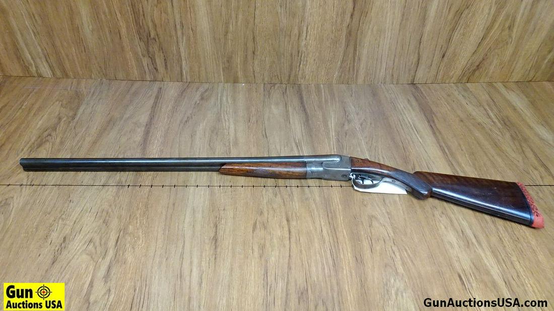 DAVIS WARNER ARMS PREMIER 20 ga. Double Barrel Shotgun. Fair Condition. 28" Barrel. Shiny Bores: DAVIS WARNER ARMS PREMIER 20 ga. Double Barrel Shotgun. Fair Condition. 28" Barrel. Shiny Bores Features a Walnut Checkered Stock, Steel Trigger Guard with Double Triggers. Most Steel in the white, Ta