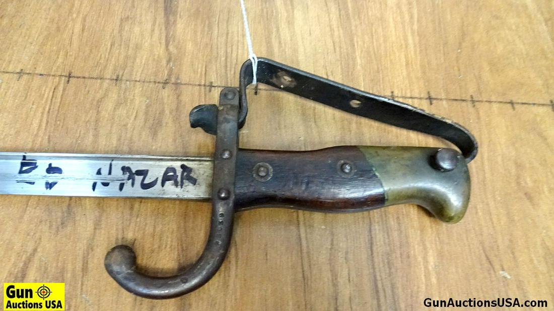 Bayonet. Good Condition. 21" Blade, 25.5" Overall with a Wood and Brass Handle. Includes a Steel: Bayonet. Good Condition. 21" Blade, 25.5" Overall with a Wood and Brass Handle. Includes a Steel Sheath. . (59436)