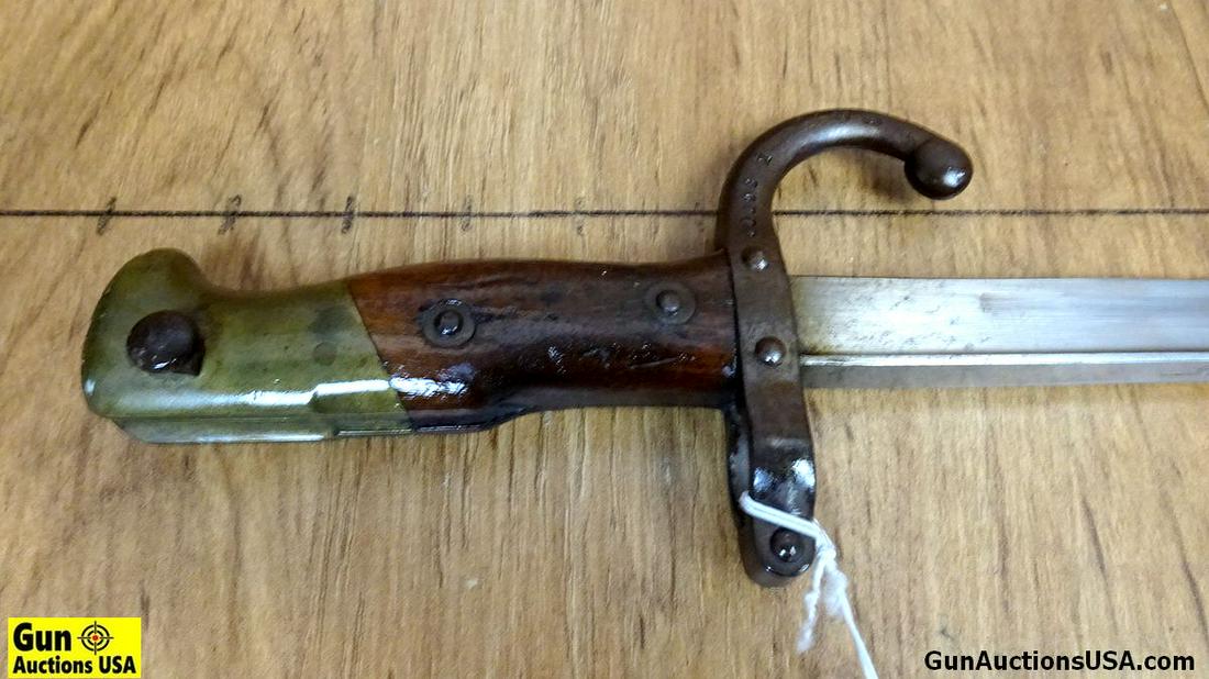 COLLECTOR'S Bayonet. Fair Condition. 20.5" Blade, 25.5" Overall Bayonet, with a Wood and Brass: COLLECTOR'S Bayonet. Fair Condition. 20.5" Blade, 25.5" Overall Bayonet, with a Wood and Brass Handle. Includes a Steel Scabbard. . (59434)