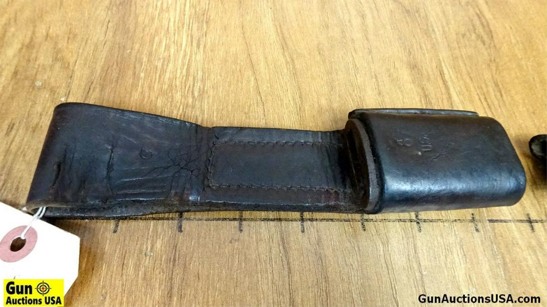 U.S. Military Surplus Scabbard. Needs Repair. U.S. Leather Bayonet Scabbard. BOMB Stamp and U.S.: U.S. Military Surplus Scabbard. Needs Repair. U.S. Leather Bayonet Scabbard. BOMB Stamp and U.S. Markings . (59427)