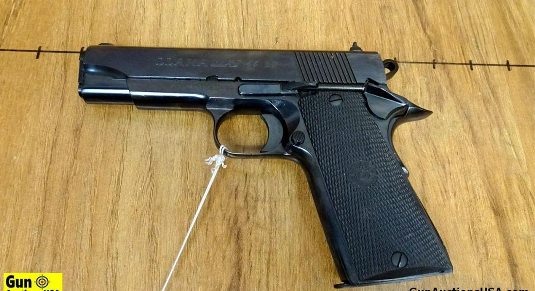 LLAMA MAX-I .45 Semi Auto Pistol. Very Good. 4 3/8" Barrel. Shiny Bore, Tight Action Single Action: LLAMA MAX-I .45 Semi Auto Pistol. Very Good. 4 3/8" Barrel. Shiny Bore, Tight Action Single Action Auto with Three Dot White Sights, Glossy Finish with Rear Cocking Serrations. Skeletonized Checkered 