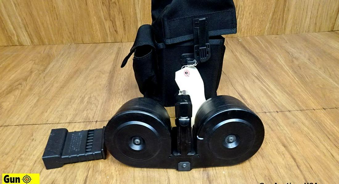 The Beta CO. C- Mag 5.56mm TWIN DRUM MAG. Excellent Condition. One Twin Polymer Drum Magazine,: The Beta CO. C- Mag 5.56mm TWIN DRUM MAG. Excellent Condition. One Twin Polymer Drum Magazine, Including Loader and Canvas C- Mag Original Case. . (60828)