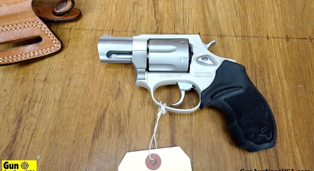 Taurus Model 856 ULTRA-LITE .38 SPECIAL Revolver. Very Good. 2 1/8" Barrel. Shiny Bore, Tight Action: Taurus Model 856 ULTRA-LITE .38 SPECIAL Revolver. Very Good. 2 1/8" Barrel. Shiny Bore, Tight Action Very Nice, Two Tone, Model 856 UL, 6 Shot Revolver. Features a Blade Front Sight, Notch Rear Sights