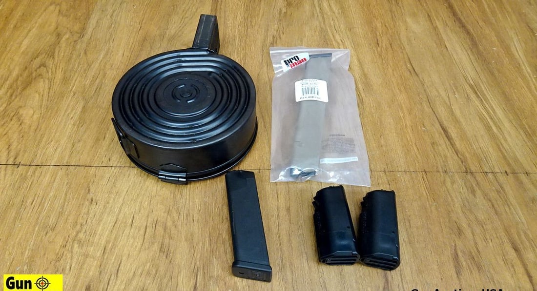 Glock, Pro Mag, Norinco, Ruger Magazines . Good Condition. Lot of 5; One Norinco AR-15 100 Rd Drum: Glock, Pro Mag, Norinco, Ruger Magazines . Good Condition. Lot of 5; One Norinco AR-15 100 Rd Drum Mag, Two Glock mags, and Two Ruger American Mags. . (64134)